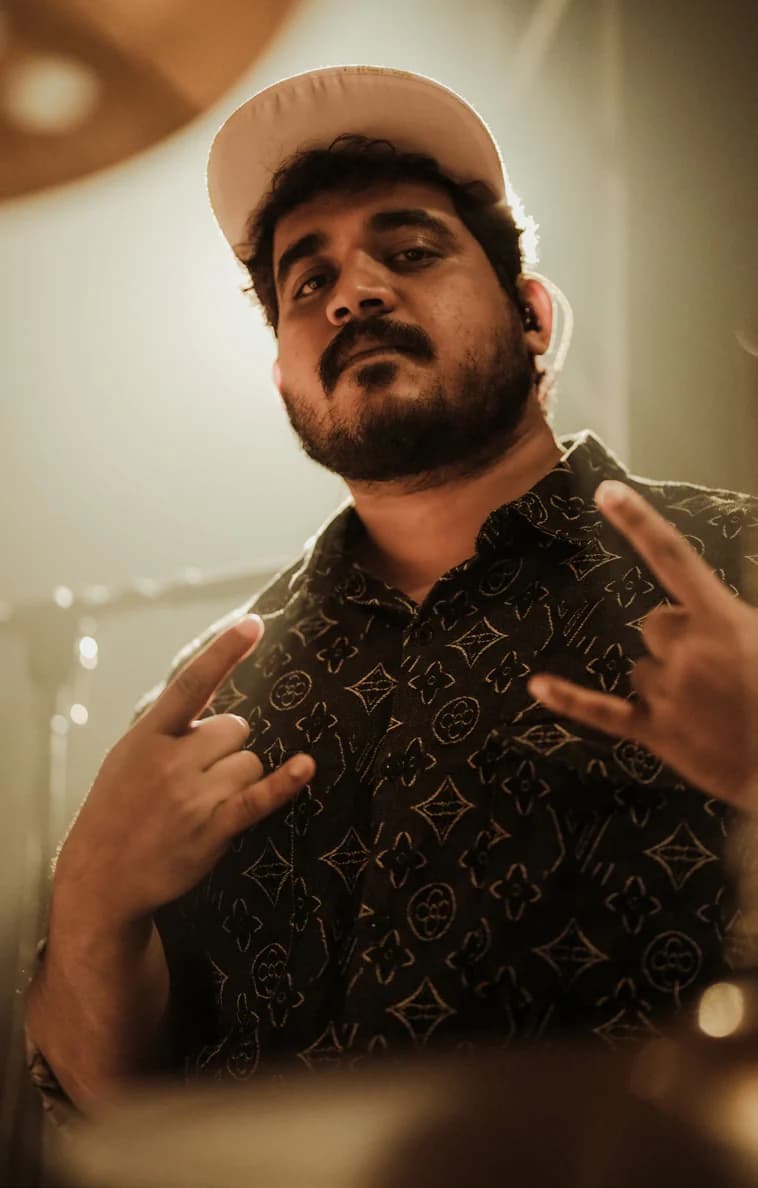Portrait of drummer and music producer Nithin Joseph from Urumi's press profile