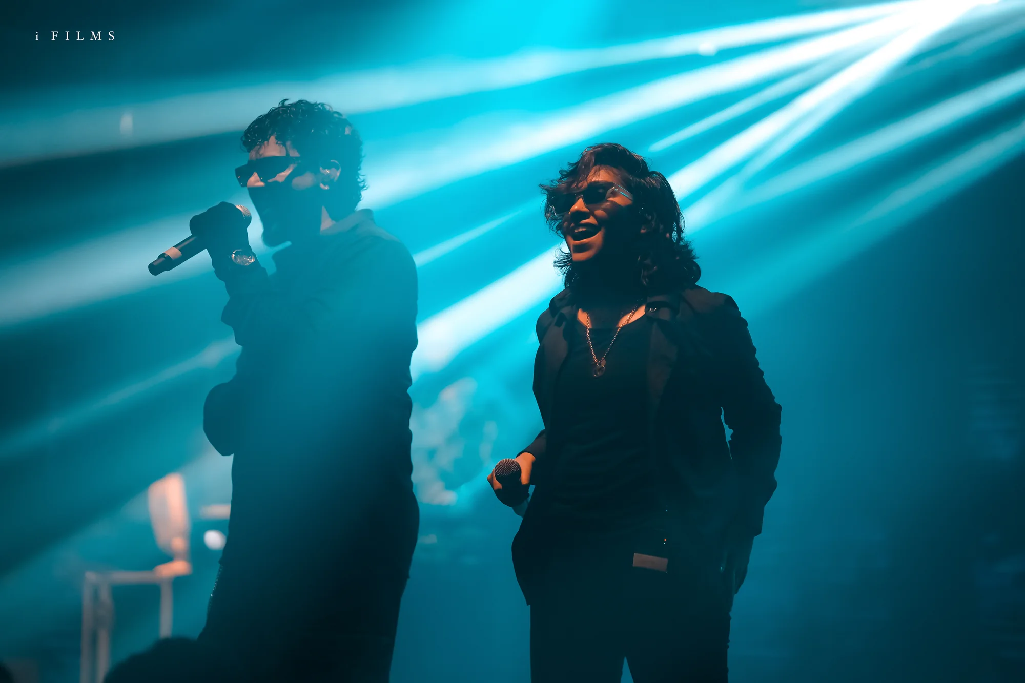 Faisal Razi and Shikha Prabhakaran sharing the Urumi stage under blue lights